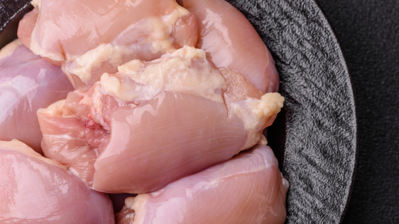 Raw chicken thigh fillet