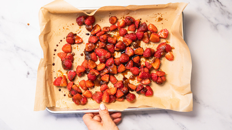 Roasted strawberries on baking sheet