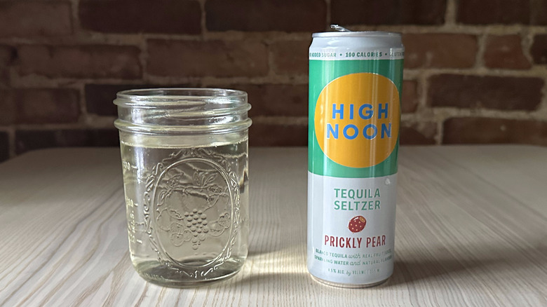Prickly Pear High Noon on table with glass