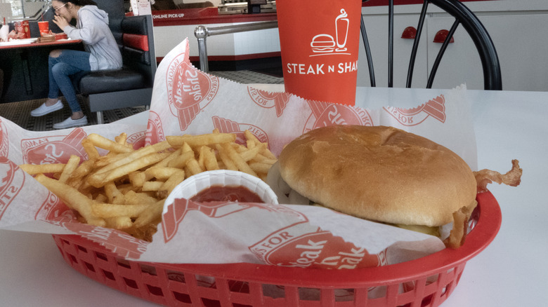 Burger and fries in a basket at Steak 'n Shake
