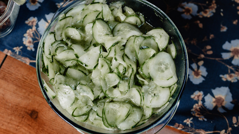 Cucumber salad in a glass bowl