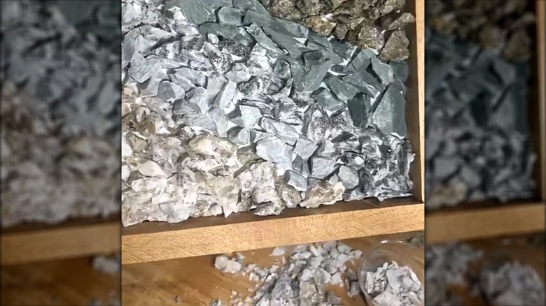Granite stones placed in wooden frame