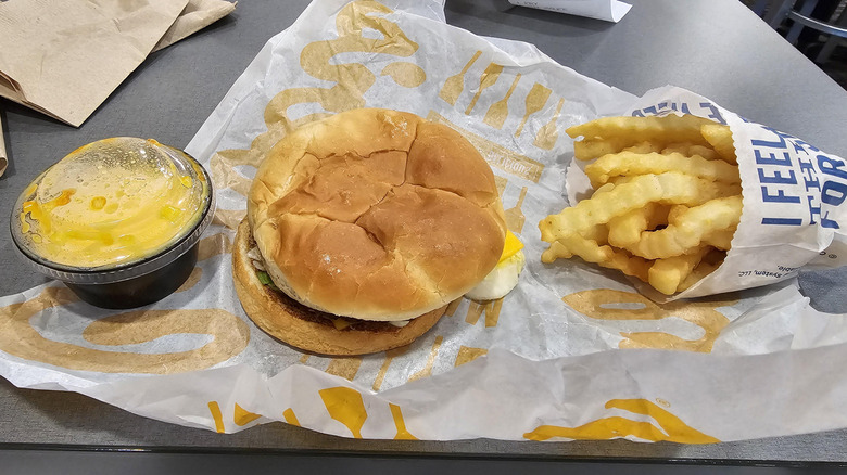 Culver's Bacon ButterBurger on a tray with a drink.