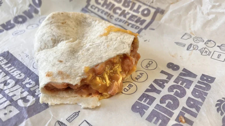 Bean and Cheese Burrito with Green Sauce on wrapper