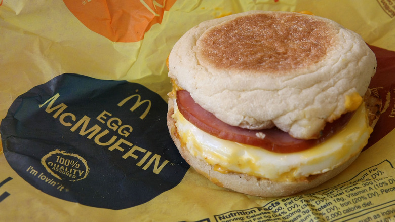 McDonald's Egg McMuffin sandwich sitting atop its paper wrapping