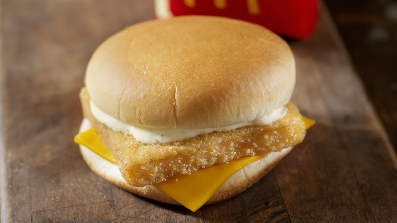 McDonald's Filet-O-Fish Sandwich sitting on a wooden table