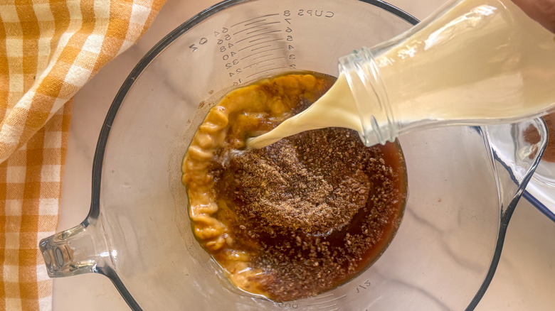 pouring milk into bowl