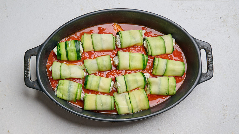 zucchini involtini in a casserole dish