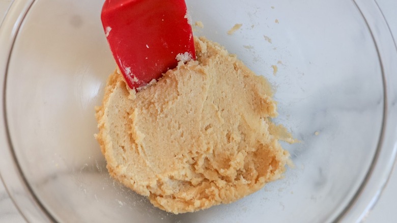 Beaten butter and sugar mixture in bowl