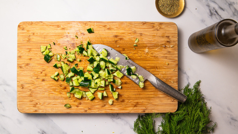 Chopped cucumber on a board