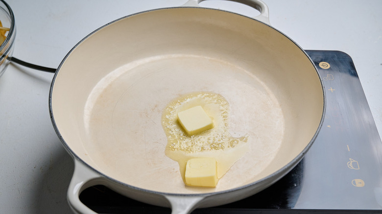 melting butter in a skillet