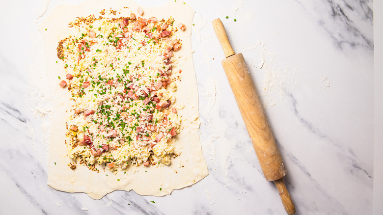 Rolled out puff pastry with filling